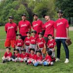T-Ball team acting silly on photo day